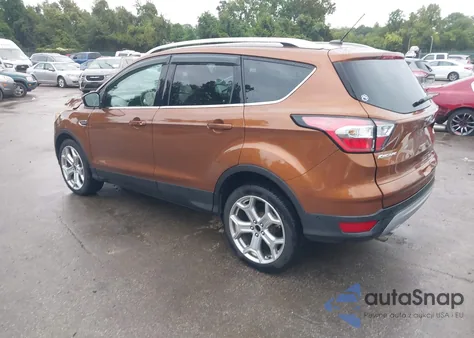 2017 Ford Escape Titanium z USA, uszkodzony, nr VIN 1FMCU9J99HUE29043